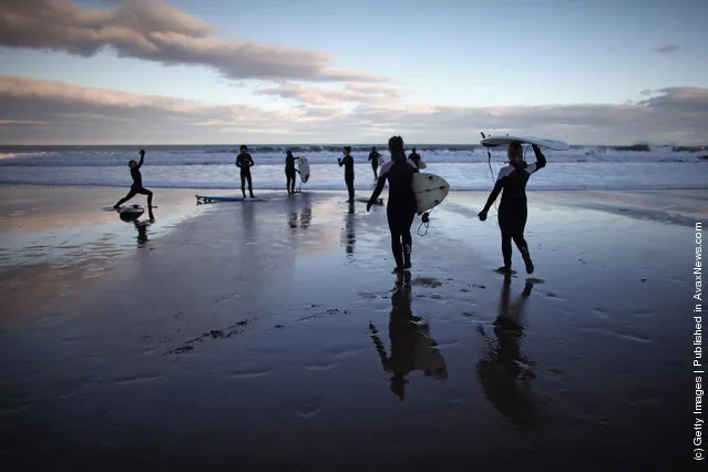 Surfers Brave The Cold To Enjoy Year Round Surfing