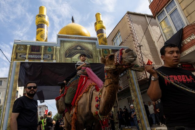 Shi'ite Muslims take part in a mourning procession to mark Ashura, the holiest day on the Shi'ite Muslim calendar, in Istanbul, Turkey on July 16, 2024. (Photo by Murad Sezer/Reuters)