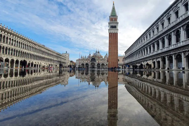 A flooded St. Mark's Square in Venice, Italy, Tuesday, November 2, 2021. (Photo by Matteo Tagliapietra/LaPresse via AP Photo)