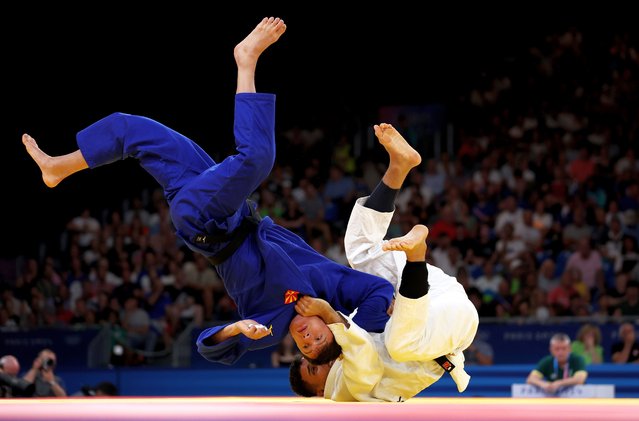 Guilherme Schimidt of Team Brazil and Edi Sherifovski of Team North Macedonia compete during the Men’s -81kg Elimination Round of 32 match between Guilherme Schimidt of Team Brazil and Edi Sherifovski of Team North Macedonia on day four of the Olympic Games Paris 2024 at Champs-de-Mars Arena on July 30, 2024 in Paris, France. (Photo by Steph Chambers/Getty Images)