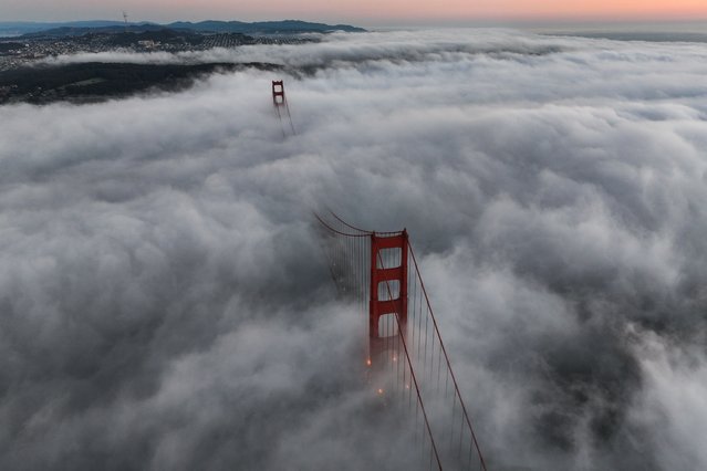 A view shows fog surrounds the Golden Gate Bridge in San Francisco, California, United States on August 27, 2024. (Photo by Tayfun Coskun/Anadolu via Getty Images)