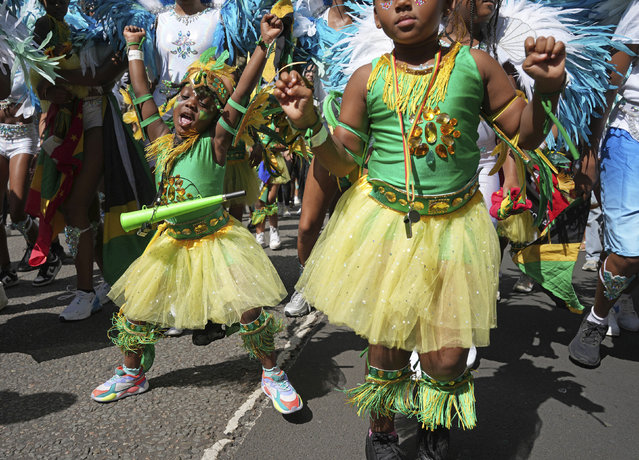 Participants taking part in the Children's Day Parade, part of the Notting Hill Carnival celebration in west London over the Summer Bank Holiday weekend on Sunday, August 25, 2024. (Photo by Jeff Moore/PA Images via Getty Images)