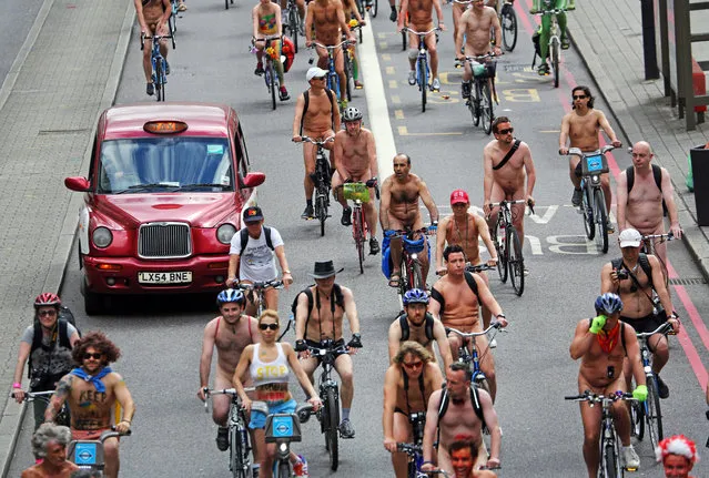 World Naked Bike Ride, London, Britain, 14 June 2014. (Photo by Paul Brown/Rex Features)