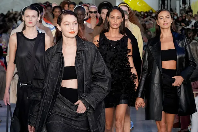 (L-R) Cara Taylor, Gigi Hadid, Joan Smalls and Irina Shayk walk the runway at the Max Mara fashion show during the Milan Fashion Week – Spring / Summer 2022 on September 23, 2021 in Milan, Italy. (Photo by Pietro S. D'Aprano/Getty Images)