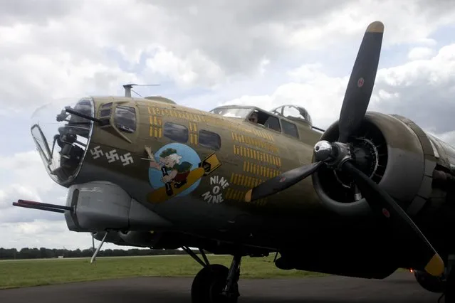 A B-17 is parked at the Air Zoo in Portage, Mich., as part of a vintage aircraft tour. The planes are featured at the museum as part of the Collings Foundation Wings of Freedom tour, which continues through Friday at the Air Zoo in Portage before making other stops. (Photo by Daytona Niles/Kalamazoo Gazette via AP Photo)