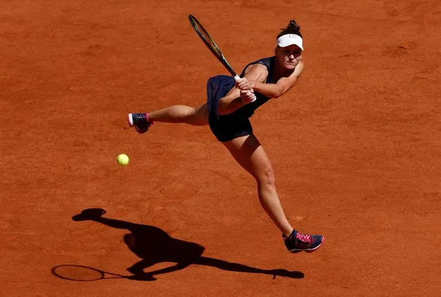 Russia's Veronika Kudermetova serves to US' Madison Keys during their women's singles match on day nine of the Roland-Garros Open tennis tournament at the Court Philippe-Chatrier in Paris on May 30, 2022. (Photo by Yves Herman/Reuters)