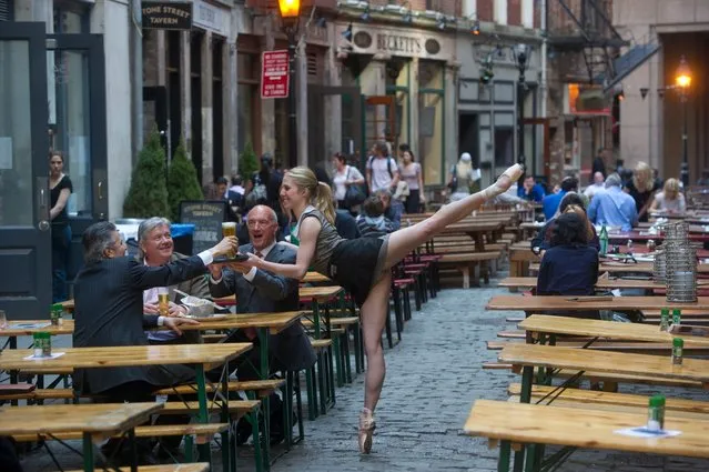 “Dancers Among Us”: Stone Street, NYC – Michelle Joy. (Photo by Jordan Matter)