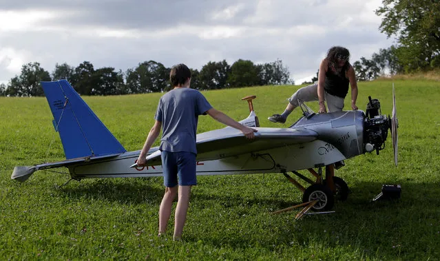 Aviator Frantisek Hadrava gets in Vampira, an ultralight plane based on the U.S.-design of light planes called Mini-Max, near the village of Zdikov, Czech Republic, August 23, 2016. (Photo by David W. Cerny/Reuters)