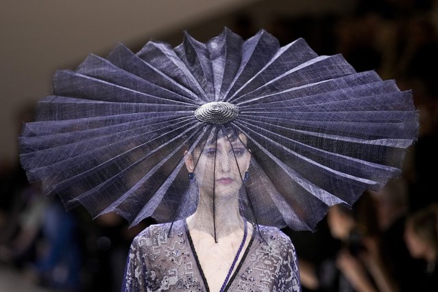 A model wears a creation for Giorgio Armani Prive as part of the Haute Couture Spring-Summer 2024 collection presented in Paris, Tuesday, January 23, 2024. (Photo by Christophe Ena/AP Photo)