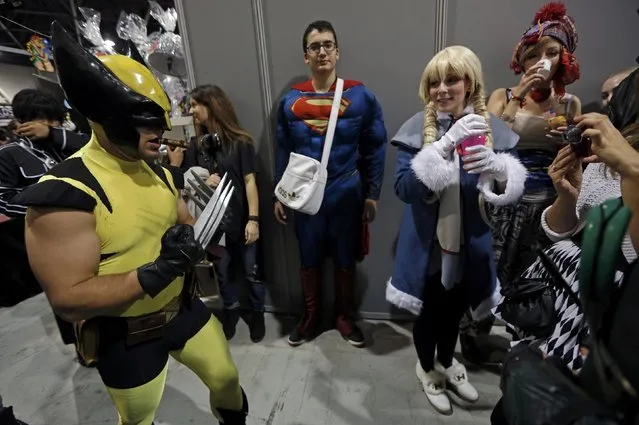 Participants dressed in superhero costumes attend the first edition of the HeroFestival in Marseille, November 9, 2014. (Photo by Jean-Paul Pelissier/Reuters)