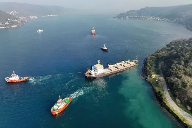 Palau flagged bulker MKK1, carrying grain under UN’s Black Sea grain initiative, is towed free after running aground in Istanbul's Bosphorus, Turkey on January 16, 2023. (Photo by Mehmet Emin Caliskan/Reuters)