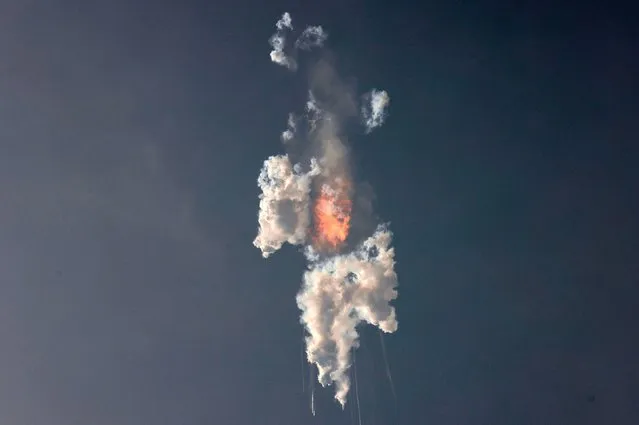SpaceX's next-generation Starship spacecraft, atop its powerful Super Heavy rocket, explodes after its launch from the company's Boca Chica launchpad on a brief uncrewed test flight near Brownsville, Texas, U.S. April 20, 2023. (Photo by Joe Skipper/Reuters)