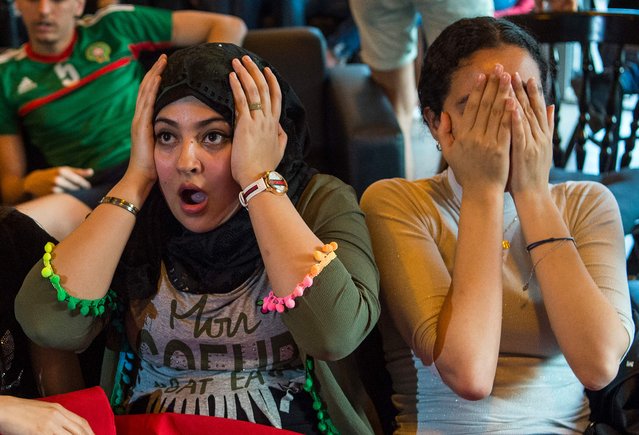 Moroccan football fans react while watching the Russia 2018 World Cup Group B match against Iran, on June 15, 2018, in Voronezh, Russia. (Photo by Fadel Senna/AFP Photo)