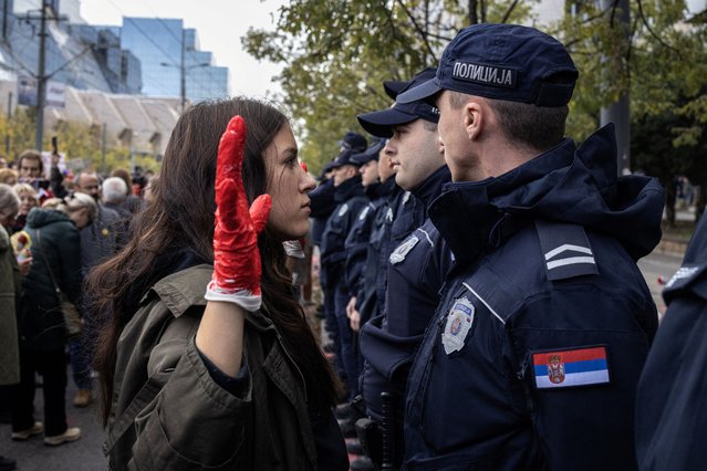 Demonstrators protest to commemorate an accident at a railway station in the Serbian city of Novi Sad, for which they blame negligence and corruption by the authorities, in front of the government in Belgrade, Serbia on November 3, 2024. (Photo by Marko Djurica/Reuters)