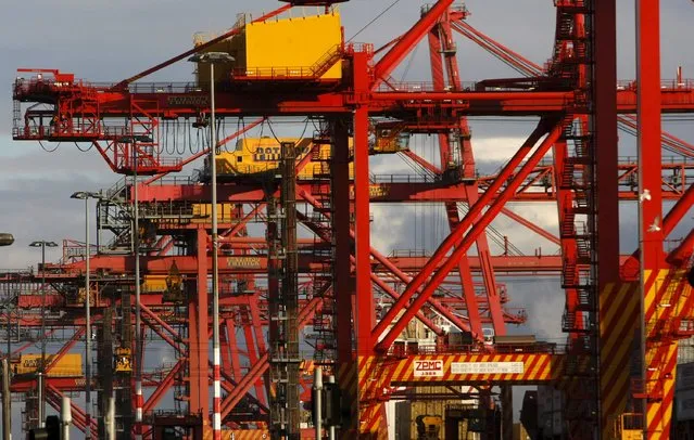 Shipping container cranes are seen at the Patrick port facility in Melbourne in this June 9, 2009 file photo. A ruling is expected this week in the attempt by Canada's Brookfield Asset Management to buy Australian port and rail giant Asciano for $6.5 billion. (Photo by Mick Tsikas/Reuters)