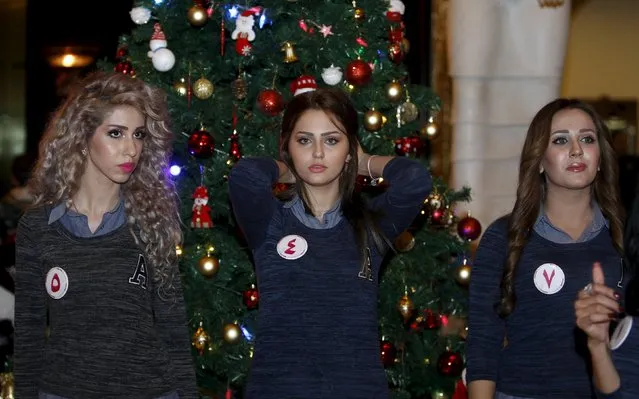 Participants pose for a photographers during the Miss Iraq Pageant in Baghdad, December 19, 2015. (Photo by Ahmed Saad/Reuters)