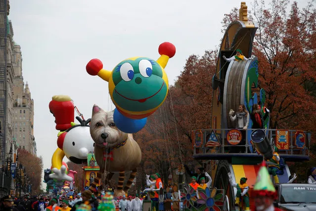 Balloons are carried down Central Park West during the 90th Macy's Thanksgiving Day Parade in Manhattan, New York, U.S., November 24, 2016. (Photo by Andrew Kelly/Reuters)