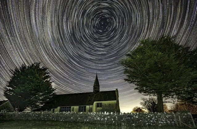 Star trails photography captures the motion of the stars caused by the rotation of the Earth in the second decade of January 2023. Mike Jeffries framed the North Star behind St Hugh’s Church at Charterhouse in the Mendip Hills, Somerset, and took 180 photos over two hours in minus 4C for this image. (Photo by Mike Jefferies/Picture Exclusive)