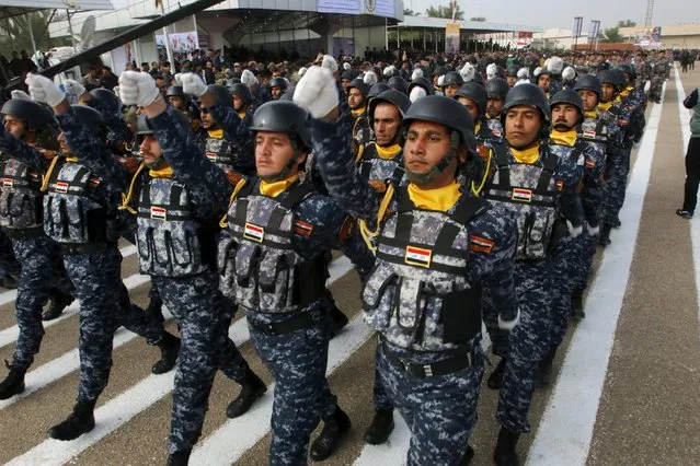 Troops of the Interior Ministry take part in a parade during a ceremony marking the Iraqi Police Day at a police academy in Baghdad January 9, 2016. (Photo by Khalid al Mousily/Reuters)
