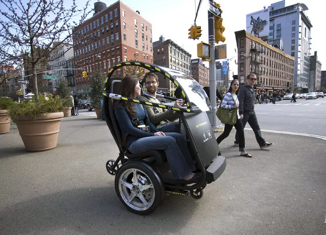 The Project P.U.M.A. prototype is shown during a test drive in Brooklyn, New York April 4, 2009. General Motors and Segway are developing an electric two-seat prototype vehicle with just two wheels, which could allow people to travel around cities more quickly, safely, quietly and cleanly, and at a lower total cost. The collaboration, dubbed Project P.U.M.A. (Photo by Reuters/Emile Wamsteker-General Motors)