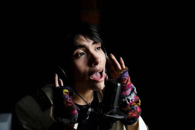 Peruvian singer Lenin Tamayo records a song as he takes on Peru's music scene with a new genre that resembles South Korean pop music but with songs in Quechua, the language of the Incas, in Lima, Peru on August 17, 2023. (Photo by Angela Ponce/Reuters)