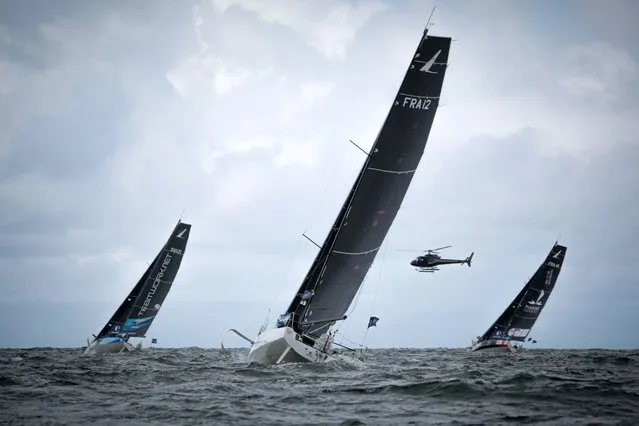 Skippers race at the start of the 2023 solo multi-stage sailing race “Solitaire du Figaro” in Ouistreham Riva-Bella near Caen, northern France on August 27, 2023. (Photo by Lou Benoist/AFP Photo)