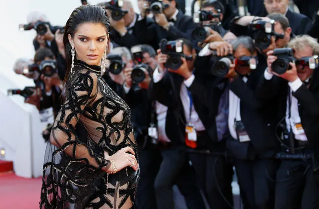 Model Kendall Jenner poses on the red carpet as she arrives for the screening of the film “Mal de pierres” (From the Land of the Moon) in competition at the 69th Cannes Film Festival in Cannes, France, May 15, 2016. (Photo by Yves Herman/Reuters)