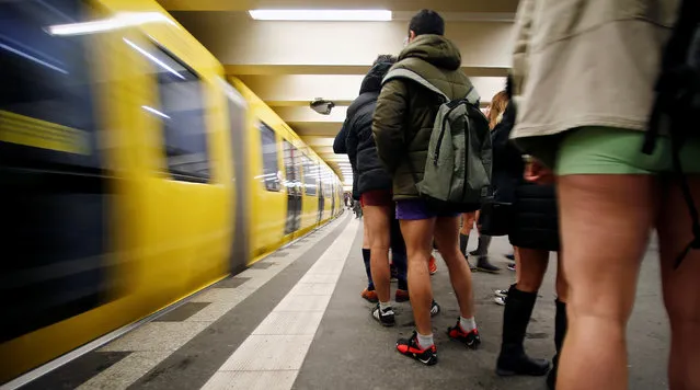 People take part in the annual “No Pants Subway Ride” in Berlin, Germany, January 8, 2017. (Photo by Hannibal Hanschke/Reuters)