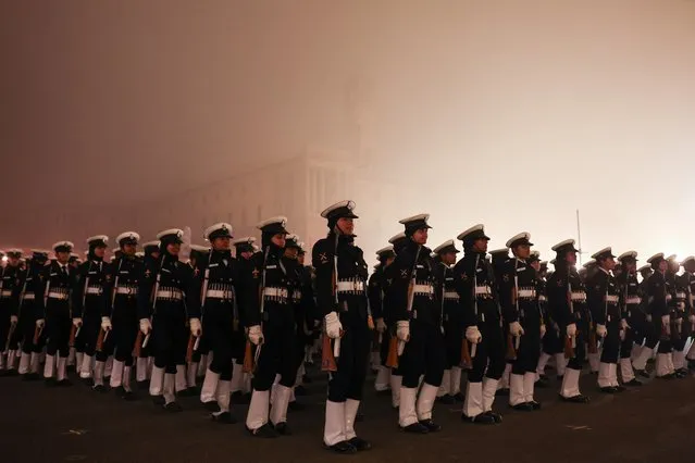 Members of the Agniveer take part in a rehearsal for the upcoming Republic Day parade on a foggy winter morning in New Delhi, India, on January 15, 2024. (Photo by Anushree Fadnavis/Reuters)