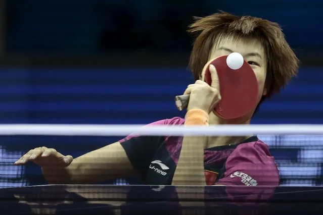China's Ding Ning serves against Nigeria's Olufunke Oshonaike in their women's singles first round match at the World Table Tennis Championships in Suzhou, Jiangsu province April 28, 2015. (Photo by Aly Song/Reuters)