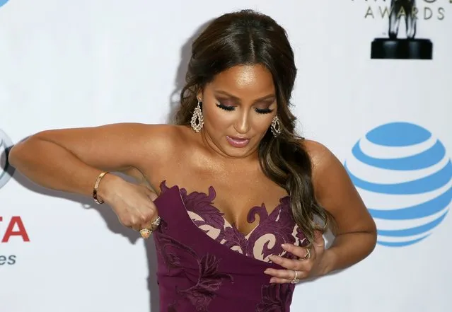 Adrienne Houghton, actress on “The Real”, adjusts her dress as she arrives at the 48th NAACP Image Awards in Pasadena, California, U.S., February 11, 2017. (Photo by Danny Moloshok/Reuters)