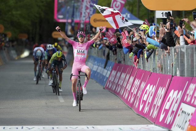 Slovenia's Pogacar Tadej celebrates winning the 8th stage of the Giro d'Italia cycling race, from Spoleto to Prati di Tivo, Italy, Saturday, May 11 2024 Italy. (Photo by Gian Mattia D'Alberto/LaPresse via AP Photo)