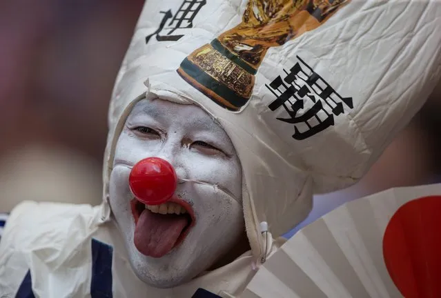 A Japanese fan waits for the United States and Japan to play in the FIFA Women's World Cup soccer championship in Vancouver, British Columbia, Canada, on Sunday, July 5, 2015. (Photo by Darryl Dyck/The Canadian Press via AP Photo)
