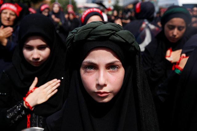 Shi'ite Muslim girls take part in a mourning procession to mark Ashura, the holiest day on the Shi'ite Muslim calendar, in Istanbul, Turkey, on July 16, 2024. (Photo by Dilara Senkaya/Reuters)
