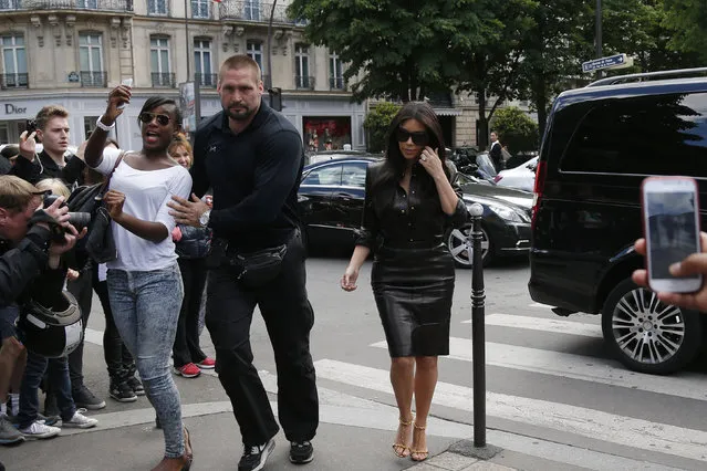 TV personality Kim Kardashian arrives for a lunch at a restaurant in Paris May 22, 2014. U.S. television personality Kim Kardashian and rapper Kanye West will celebrate their wedding in Florence on May 25, an official from the mayor's office confirmed on Friday. (Photo by Gonzalo Fuentes/Reuters)