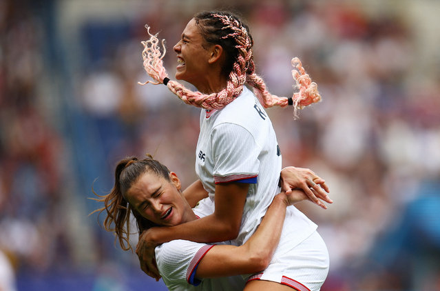 Trinity Rodman (right) celebrates with Emily Fox after scoring the extra-time winner for the United States in their quarter-final against Japan at Parc des Princes in Paris, France on August 03, 2024. (Photo by Agustín Marcarian/Reuters)