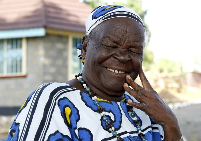 Sarah Hussein Obama, step-grandmother to U.S. President Barack Obama, smiles at their homestead in the village of Kogelo, west of Kenya's capital Nairobi, July 14, 2015. (Photo by Thomas Mukoya/Reuters)
