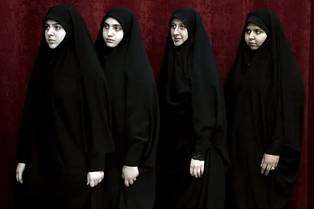Female students of Lebanon's Hezbollah queue to receive their graduation certicifates during the group's ceremony to honour the children of its fallen fighters in Beirut July 25, 2015. The Lebanonese Hezbollah group believes it can still count on Iran's support following Tehran's nuclear deal with world powers, leader Sayyed Hassan Nasrallah said on Saturday. (Photo by Aziz Taher/Reuters)