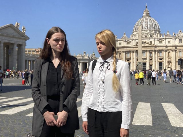 Kateryna Prokopenko, right, wife of Azov Regiment Commander Denys Prokopenko, and Yuliia Fedosiuk, both from Ukraine, talk with The Associated Press at the end of the weekly general audience where they met with Pope Francis in St. Peter's Square at The Vatican, Wednesday, May 11, 2022. (Photo by Nicole Winfield/AP Photo)