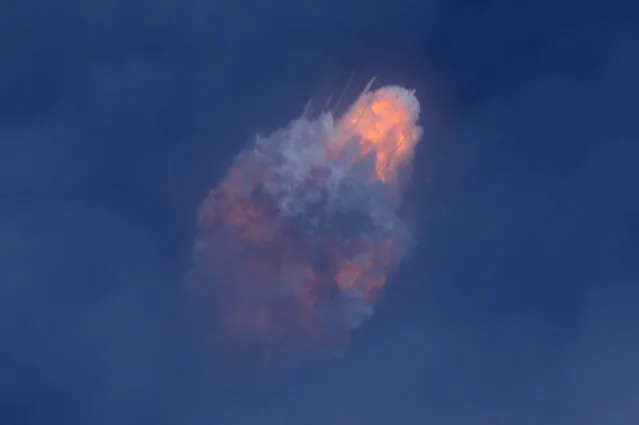 A SpaceX Falcon 9 rocket engine self-destructs after jettisoning the Crew Dragon astronaut capsule during an in-flight abort test, a key milestone before flying humans in 2020 under NASA's commercial crew program, after lift off from the Kennedy Space Center in Cape Canaveral, Florida, U.S. on January 19, 2020. (Photo by Joe Rimkus Jr./Reuters)