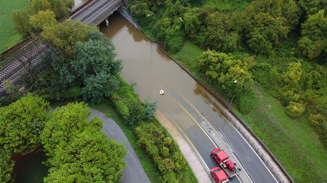 Rescue operations to make the Celle underpass accessible, completely flooded following the wave of bad weather that hit central Italy, in Rimini, Emilia-Romagna region, Italy, 19 September 2024. The low-pressure system Boris brought heavy rain to central and eastern Europe starting on 11 September 2024 with five times the average monthly rainfall for September within a few days according to the EU's Copernicus programme. Hundreds of thousands were evacuated from their homes across the region and more than twenty people died according to the latest reports from the countries affected. (Photo by Dorin Mihai/EPA/EFE)