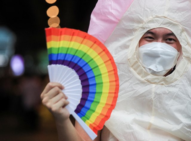 A person attends a LGBTQ+ Pride parade in Bangkok, Thailand on June 5, 2022. (Photo by Soe Zeya Tun/Reuters)