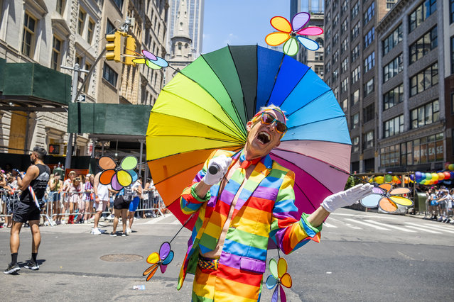 A reveller participates during the Pride Parade on June 26, 2022 in New York City. (Photo by Milo Hess/ZUMA Press Wire/Rex Features/Shutterstock)