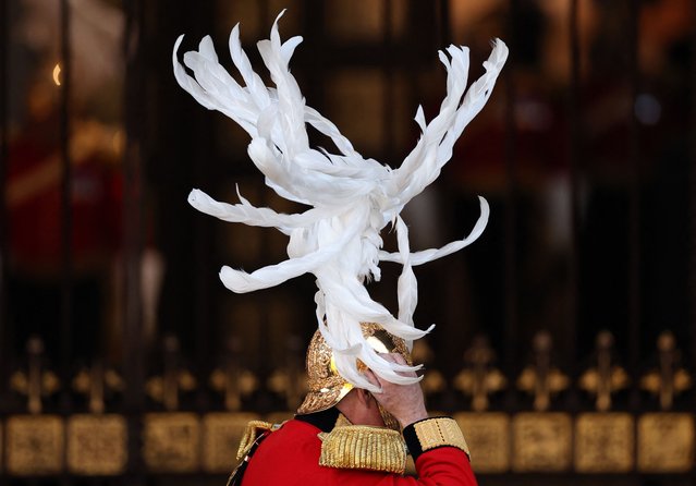 Members of The King's Body Guards of the Honourable Corps of Gentlemen at Arms arrive for the State Opening of Parliament at the Houses of Parliament, in London, on November 7, 2023. (Photo by Daniel Leal/Pool via AFP Photo)