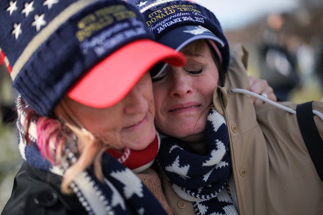 Tammy Holt and Vicky Askew, from Alabama, react after Donald Trump was sworn in at his inauguration ceremony for his second presidential term, in Washington on January 20, 2025. (Photo by Daniel Cole/Reuters)