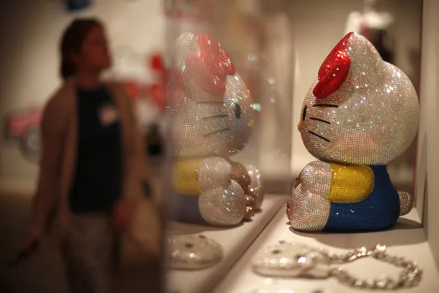 People view the “Hello! Exploring the Supercute World of Hello Kitty” museum exhibit in honor of Hello Kitty's 40th anniversary, at the Japanese American National Museum in Los Angeles, California October 10, 2014. (Photo by Lucy Nicholson/Reuters)