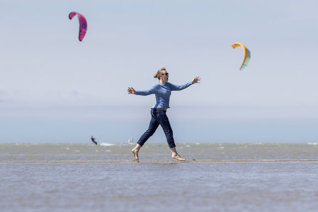Kite surfing and summer fun on Gravelines beach near Dunkirk in northern France on May 31, 2025. (Photo by Jack Hill/The Times/The Sunday Times)
