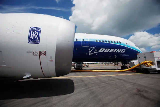 A view of one of two Rolls Royce Trent 1000 engines of the Boeing 787 Dreamliner during a media tour of the aircraft ahead of the Singapore Airshow in Singapore February 12, 2012. (Photo by Edgar Su/Reuters)