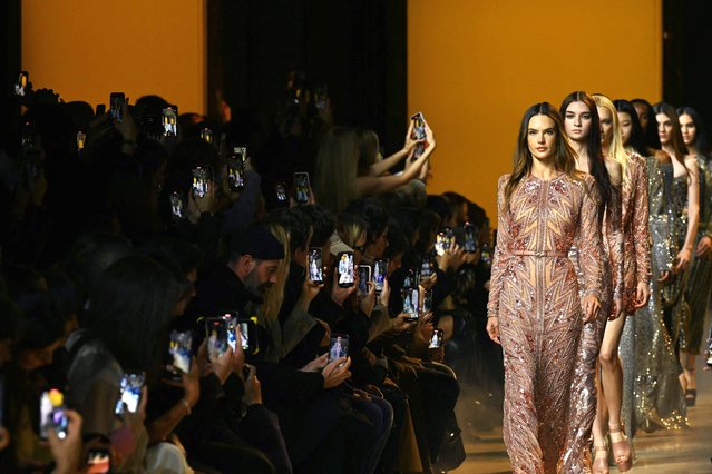 Brazilian model Alessandra Ambrosio presents a creation by Elie Saab for the Women Ready-to-wear Fall-Winter 2024/2025 collection as part of the Paris Fashion Week, in Paris on March 2, 2024. (Photo by Miguel Medina/AFP Photo)