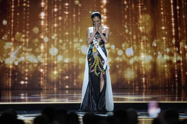Miss Bhutan Tashi Choden competes in the evening gown competition during the preliminary round of the 71st Miss Universe Beauty Pageant in New Orleans, Wednesday, January 11, 2023. (Photo by Gerald Herbert/AP Photo)